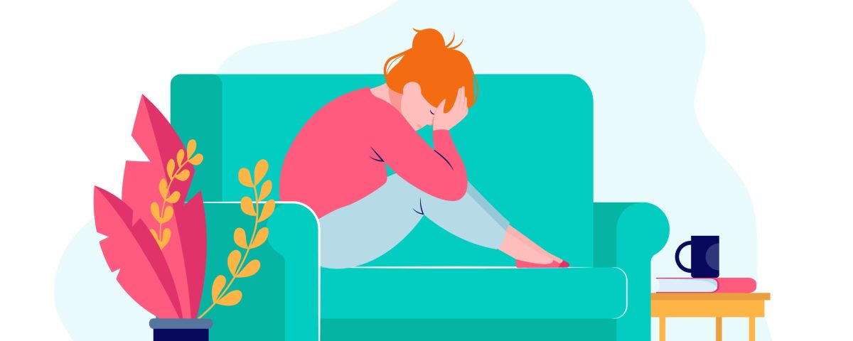 Mladá depresívna žena na sedačke